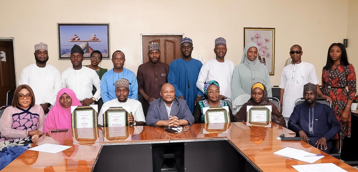 Magashi with the AMGF Team